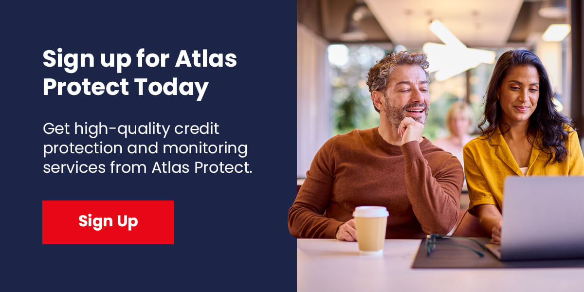 Man and woman signing up for Atlas Protect online