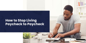 Young adult male planning out his living expenses