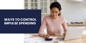 Woman calculating her budget and costs on a laptop